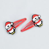 Pingvin, mikulás sapkában, csitt-csat.